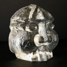 1960's Skrufs Glasbruk glass stylized head paperweight, signed & numbered.
