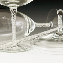 Hand blown with air twist decor on finial, stems and rare stir stick.