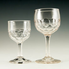 Interesting pair of 19th Century EAPG glass Honeycomb goblets. The pattern was popular in eateries and taverns during the 1850's - 1880's.