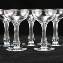 Set of 5 high quality blown and cut crystal champagne cocktails with hollow stems.