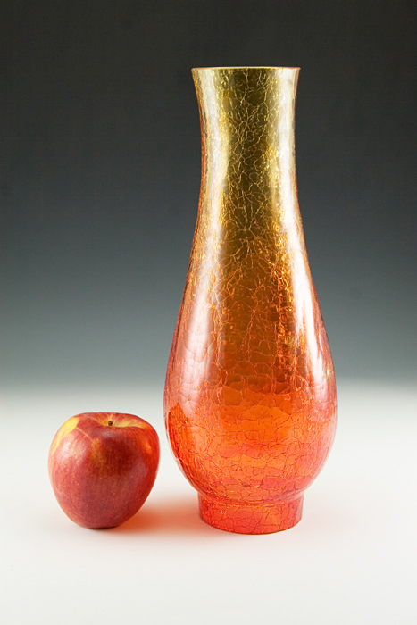 Made in the mid-20th century. American made in the West Virginia region of glass makers. Probably by Viking Art Glass, Blenko Art glass or Kanawha Glass.