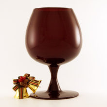 Quality made of real lead ruby crystal from 1950's Italy. Retro modern stylized stem. High-end goblet vase, blown by hand in rich ruby red crystal. Rings like a bell.
