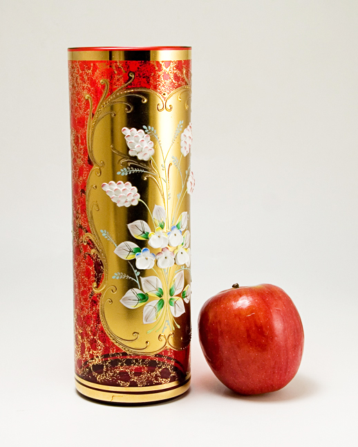 Blown ruby glass vase measures 8.5" high with a 3" wide opening, larger than most examples we've seen.