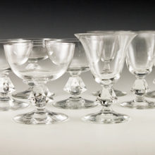 Vintage cut crystal stemware set with cut rohmbus shaped stems. The 4-sided stem is solid crystal with sharp edges. The uneven square causes a prism effect.