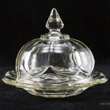Big, sturdy Depression Glass covered dish. Most often used as a butter dish, but great for cheese balls, caviar, etc.