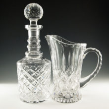 Beautiful heavy pressed crystal decanter and full-size pitcher.
