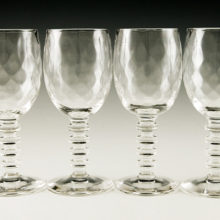 Atomic era vintage glass stemware set with pressed disc knop stems and blown diamond optic bowls. Beautiful quality lead crystal stemware from the 1950's.