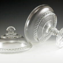 Large, EAPG glass covered comport measures 9½" tall and 8" at widest. Widest girth is 24". Weighs almost 3 lbs.