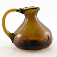 Fascinating little brown jug hand-blown a long, long, long time ago. How old? Guessing 1800's, perhaps earlier, could be 18th century.
