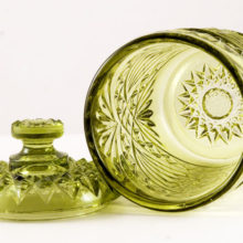 This pattern appeared in Imperial's catalogs around 1912. Imperial, in business form 1901 to 1984, re-issued many of their antique patterns. This jar was made in the 1950's to 1970's. On the inside center of the base, Imperial's 'I' superimposed over a 'G' mark is impressed into the glass. This mark was used from 1951 to 1972.