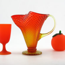Stunning vintage glass pitcher vase in light yellow graduating to orange color and diamond point pattern. The color is called Persimmon.