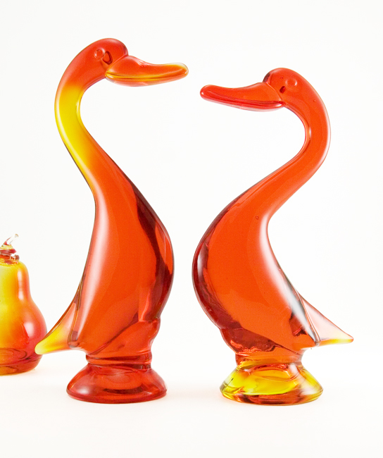 Viking Art Glass duck figurines from the Epic line, catalog #1317. Viking Art Glass duck figurine shown in "House and Garden" Viking advertisement in May 1964. Circa 1960-1970.