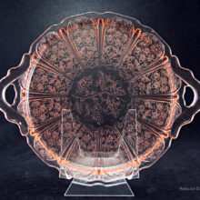 Pink Depression glass made by Jeannette Glass. Pattern originally produced between 1930 and 1939.