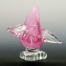 Beautiful Italian glass pink opaline bird figurine in lift-off motion. Measures 4½" tall, 6½" long, and 4" at widest. Weighs 1 lb.