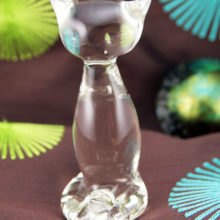 Mid-century modern stylized crystal cat figurine in colorless glass. Made in the 1960's by Rainbow Art Glass, USA.