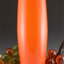Large vintage retro mod orange-orange vase cased in white and colorless glass.