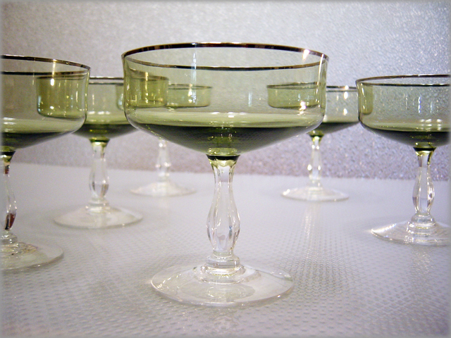 Elegant set of 6 platinum banded dessert compotes. Lovely olive green vessels point to circa 1970s, could be much earlier.