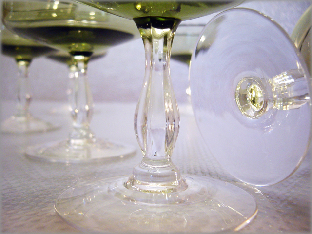 The stem shape points to Fostoria Glass, unconfirmed. The vessels are blown with applied, tooled stems.