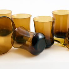 This martini set has a amber glass stirrer. High quality glass, blown thin, with swirled pontil marks on bases.