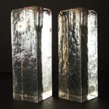 This candlestick holder set by Blenko Art Glass was made by hand in the 1980's. One candlestick holder still has the label attached.