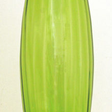 Retro modern glass bullet vase made in 1960's Italy. Still retains its old Made in Italy label. Will hold an armful of long stemmed flowers, grasses, etc.