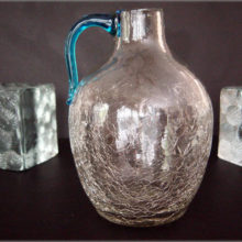Clear crackle jug with applied blue handle, Blenko Art Glass pattern #417 or possibly made by Pilgrim Art Glass who also made this exact form.