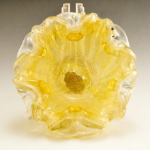 Mesmerizing art glass cased in canary yellow and colorless crystal with layers of fine gold and silver veil sandwiched between. Beautiful bowl with multiple uses.