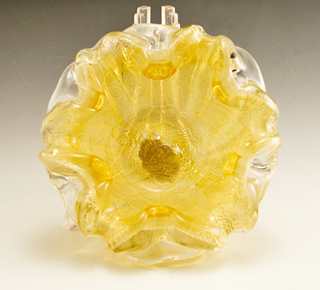 Mesmerizing art glass cased in canary yellow and colorless crystal with layers of fine gold and silver veil sandwiched between. Beautiful bowl with multiple uses.