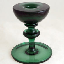 Large and heavy antique glass candle holder weighs 2 lbs. Hand-made, hand-formed green glass.