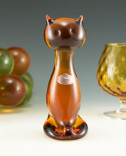 Hand formed stylized sitting cat by Rainbow Art Glass, circa 1960's.