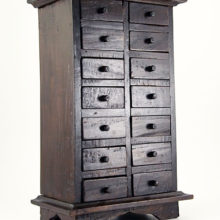 Primitive chest of drawers made by hand.