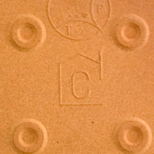 The large tile is marked extensively by the maker, but were unable to identify the marks.