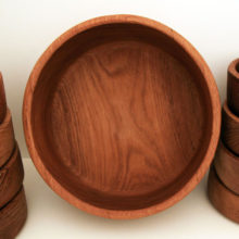 The teak table service set is made from beautiful teakwood with an interesting grain and is well-preserved.