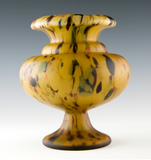This mottled satin urn vase was completely hand-made with heavy, quality glass.