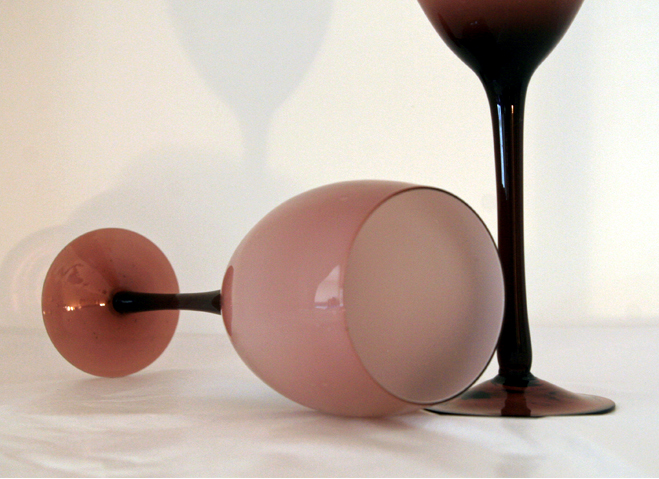 Trapped air bubbles are commonly found on hand made glass from the 1950's to 1960's.