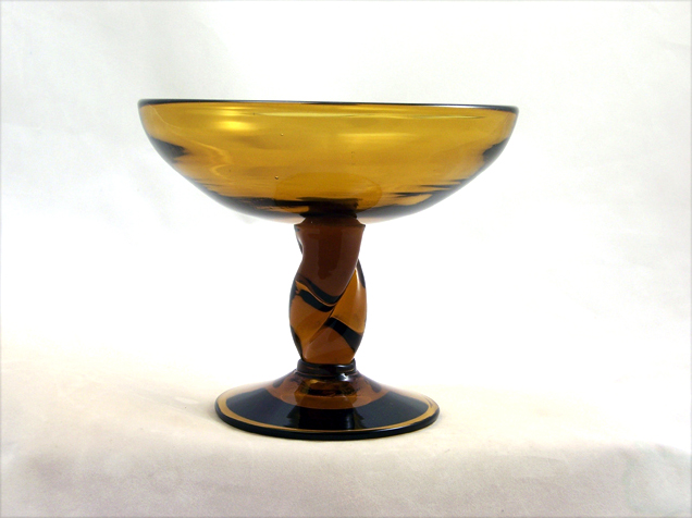 Lovely deep amber vintage glass compote with twisted stem.