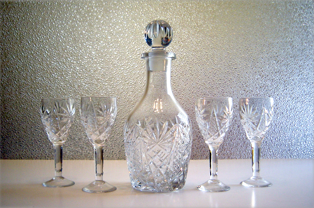 A lovely old Depression crystal decanter and cordial set. Circa estimated 1920's - 1940's.