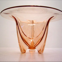 The pink rocket vase is a beautiful piece of Depression Era glass.