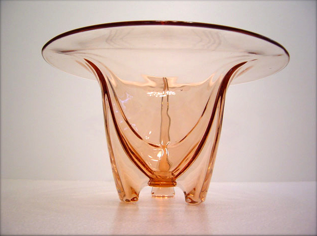 The pink rocket vase is a beautiful piece of Depression Era glass.