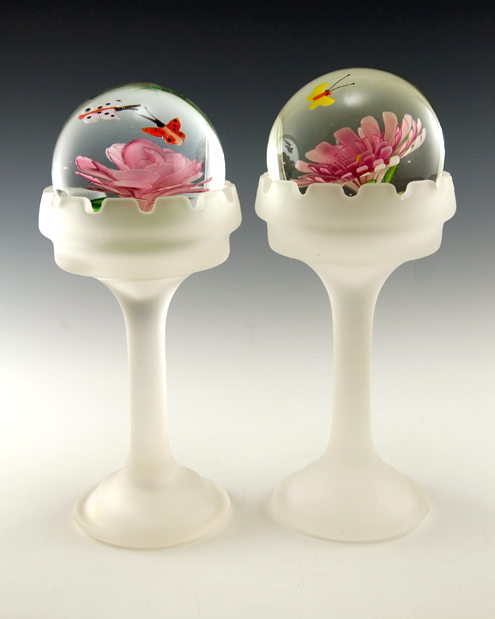 In another image, we've placed this and another flower and butterfly paperweight (available separately) inside the turrets of two Party Lite tall candleholders (also available separately).