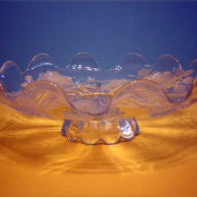 Large crystal cake plate with frosted intaglio rose decor.
