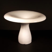 The giant retro mushroom stand has a "dip" in top center allowing for many design options inside or out.