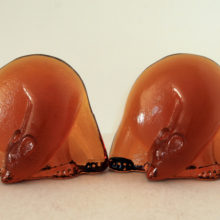 Lovely set of polar bears glass bookends in thick beautiful amber glass.