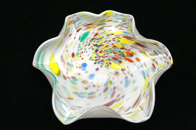 This type of colorful spotted decor is often called "End-of-Day Glass".