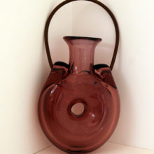 Forato hand blown flask with aged metal handle in amethyst glass.