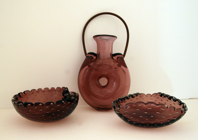 Forato hand blown flask with organic styling with an ancient artifact flare.