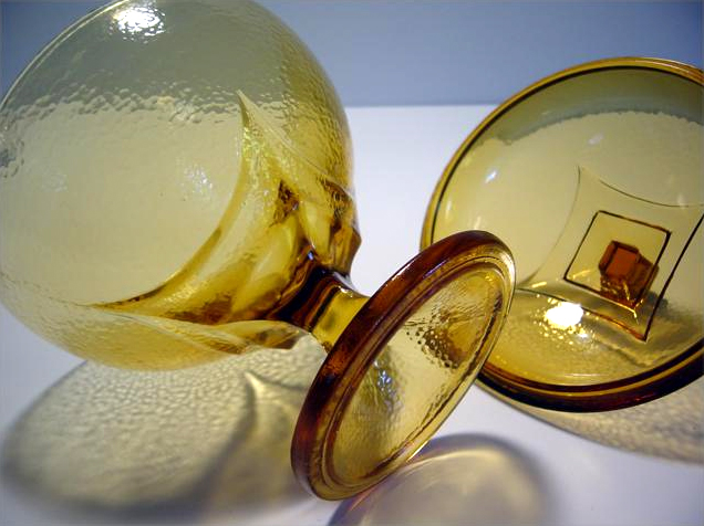 The Hazel Atlas mark is on the base of this amber colony covered compote.