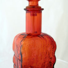 Striking flame orange textured retro bark glass decanter for serving wine or liquor.
