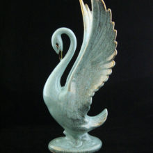 Stunning vintage pottery swan figurine.