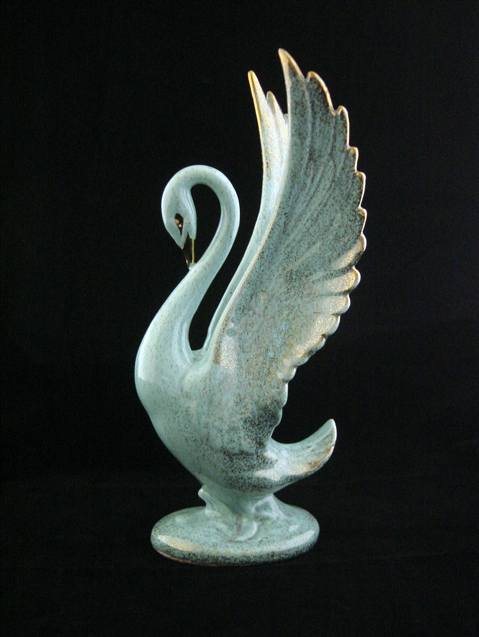 Stunning vintage pottery swan figurine.